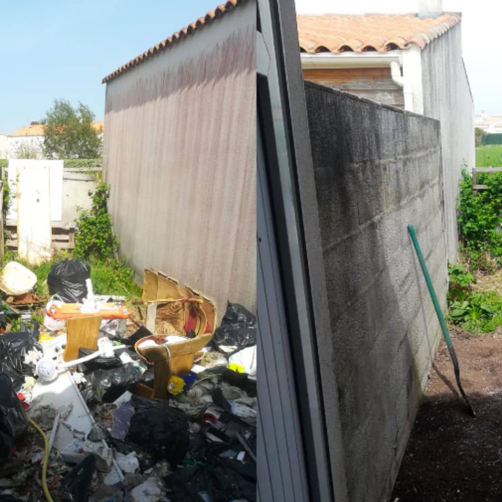 Encombrants et déchets entassés le long d’un mur avant enlèvement